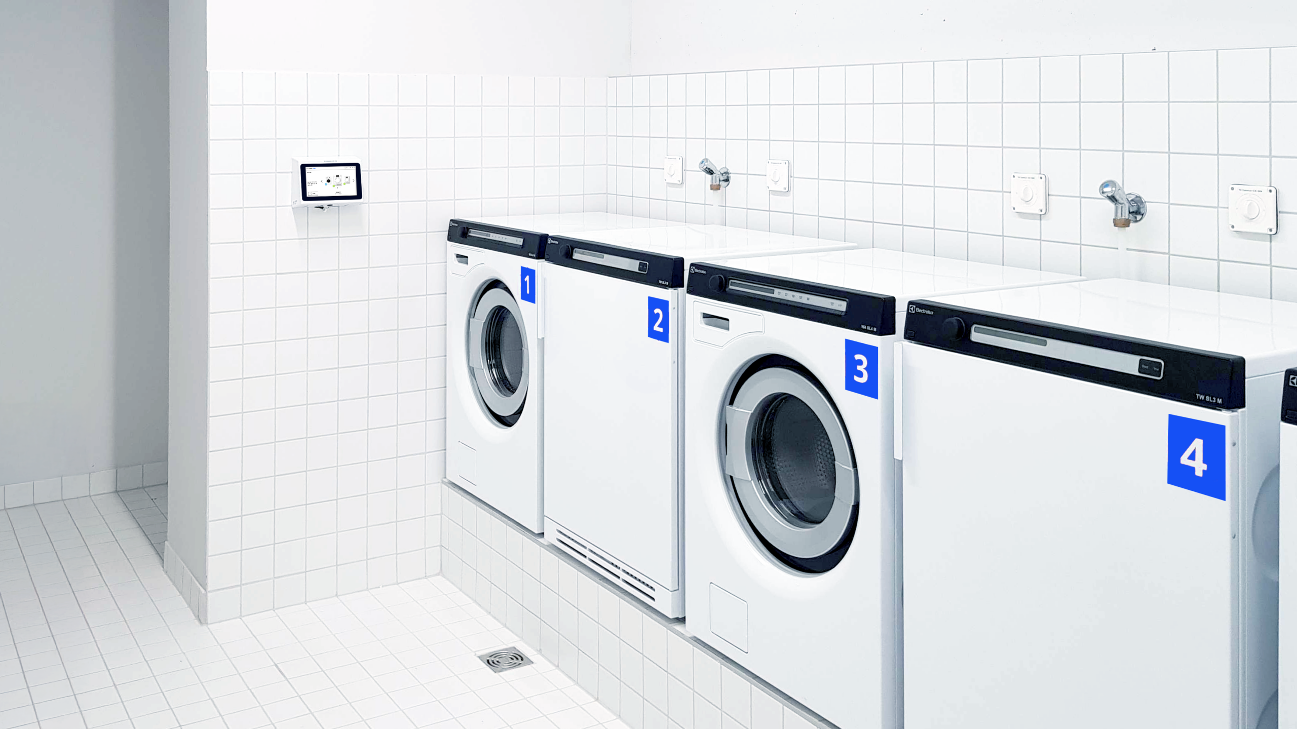 Une buanderie équipée de SharemanWash, la solution de gestion de buanderie collective